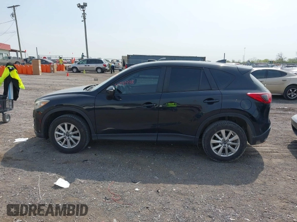 2016 Mazda CX-5 Sport with VIN JM3KE4BY8G0746377, listed as a IAAI auction lot 41990988 with 144,558 mi miles and . Bid and sale history available at carsss.com. Image 14.