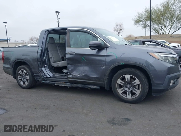 2017 Honda Ridgeline RTL-T with VIN 5FPYK2F67HB002854, listed as a IAAI auction lot 41895895 with 86,882 mi miles and . Bid and sale history available at DreamBid. Image 6.