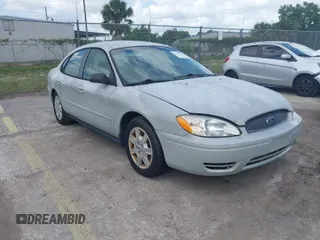 2006 Ford Taurus SE with VIN 1FAFP53U56A209213, listed as a IAAI auction lot 42009423 with 118,083 mi miles. Bid and sale history available at carsss.com. Image 1.