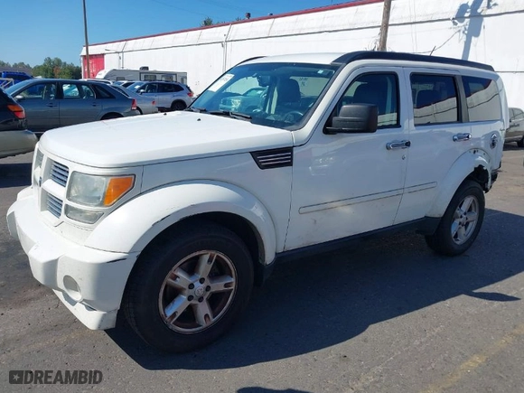 2010 Dodge Nitro SXT with VIN 1D4PU5GK3AW115958, listed as a IAAI auction lot 40357456 with 162,548 mi miles. Bid and sale history available at carsss.com. Image 2.