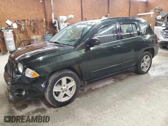 2010 Jeep Compass Sport with VIN 1J4NF4FB5AD589426, listed as a Copart auction lot 47644715 with 172,311 mi miles and Salvage Title. Bid and sale history available at carsss.com. Image 1.