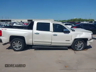 2014 Chevrolet Silverado 1500 High Country with VIN 3GCUKTEC4EG409072, listed as a IAAI auction lot 41986843 with 124,058 mi miles. Bid and sale history available at carsss.com. Image 14.