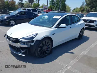 2022 Tesla Model 3 Performance with VIN 5YJ3E1ECXNF270238, listed as a IAAI auction lot 42173668 with 13,017 mi miles and . Bid and sale history available at DreamBid. Image 21.
