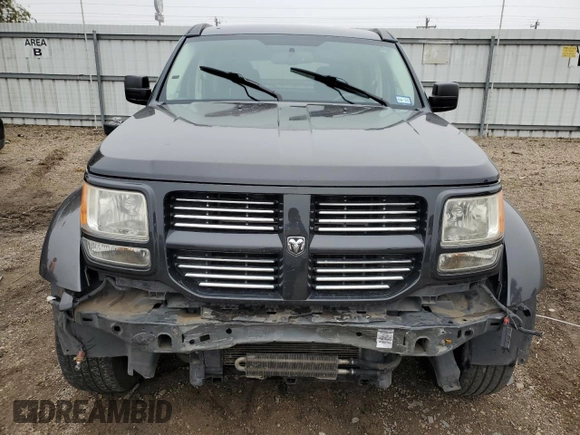2011 Dodge Nitro SXT z VIN 1D4PT5GK0BW509907, wystawiony jako Copart lot #42716715 z przebiegiem 88 884 mil mil oraz Szkody całkowita. Historia ofert i sprzedaży dostępna na DreamBid. Obrazek 5.