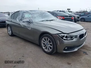 2018 BMW 3 Series 320i with VIN WBA8E1G51JNU92342, listed as a IAAI auction lot 41641934 with 27,477 mi miles. Bid and sale history available at carsss.com. Image 1.