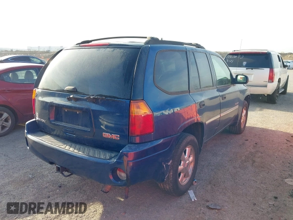 2006 GMC Envoy SLE with VIN 1GKDS13SX62315193, listed as a IAAI auction lot 41866029 with 231,164 mi miles. Bid and sale history available at carsss.com. Image 4.