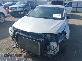 2019 Chevrolet Malibu LS with VIN 1G1ZB5STXKF147683, listed as a IAAI auction lot 42123608 with 104,692 mi miles and . Bid and sale history available at DreamBid. Image 6.