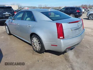 2013 Cadillac CTS Luxury z VIN 1G6DG5E56D0112860, wystawiony jako IAAI lot #41970874 z przebiegiem 125 647 mil mil oraz . Historia ofert i sprzedaży dostępna na DreamBid. Obrazek 3.