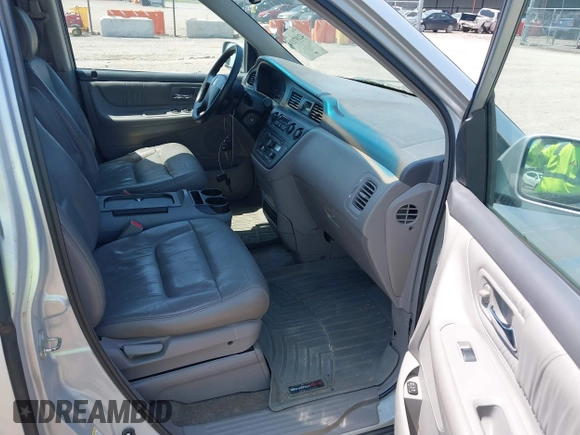 2003 Honda Odyssey EX-L z VIN 5FNRL18053B088851, wystawiony jako IAAI lot #42197114 z przebiegiem 219 456 mil mil oraz . Historia ofert i sprzedaży dostępna na DreamBid. Obrazek 5.
