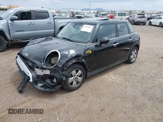 2015 MINI Hardtop 4 Door z VIN WMWXS5C58FT831568, wystawiony jako IAAI lot #42129819 z przebiegiem 76 044 mil mil oraz . Historia ofert i sprzedaży dostępna na DreamBid. Obrazek 2.