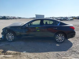 2015 Infiniti Q50 Premium with VIN JN1BV7AR0FM397827, listed as a IAAI auction lot 41774729 with 85,616 mi miles. Bid and sale history available at carsss.com. Image 14.