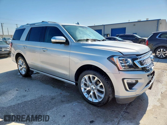 2019 Ford Expedition Platinum with VIN 1FMJU1MT4KEA65194, listed as a Copart auction lot 58161715 with 100,983 mi miles and Salvage title. Bid and sale history available at DreamBid. Image 4.