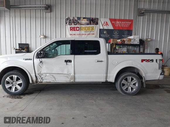2015 Ford F-150 XLT z VIN 1FTEW1EF0FFB70257, wystawiony jako IAAI lot #42084443 z przebiegiem 123 351 mil mil oraz . Historia ofert i sprzedaży dostępna na DreamBid. Obrazek 14.