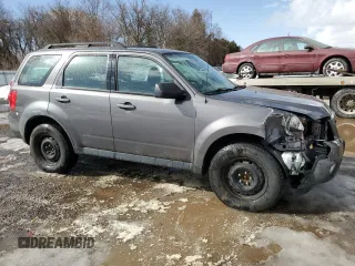 2011 Mazda Tribute Touring with VIN 4F2CY0C75BKM03624, listed as a Copart auction lot 47838305 with 188,952 mi miles and Salvage Title. Bid and sale history available at carsss.com. Image 4.