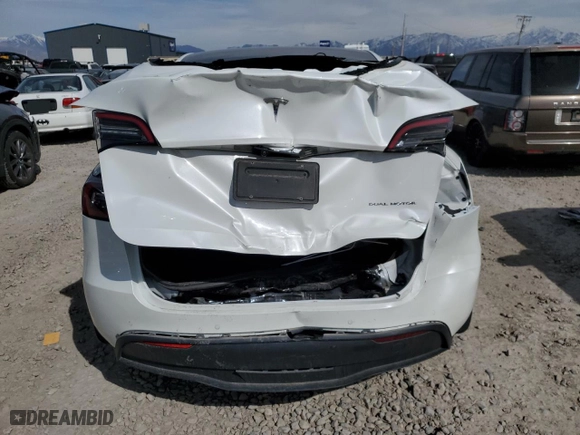 2021 Tesla Model Y Long Range with VIN 5YJYGDEEXMF268300, listed as a Copart auction lot 52196315 with 33,280 mi miles and Salvage Title. Bid and sale history available at carsss.com. Image 6.