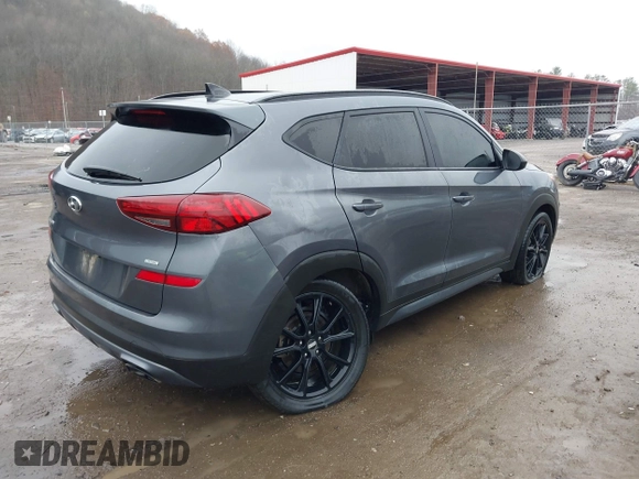 2019 Hyundai Tucson Ultimate with VIN KM8J3CAL2KU929121, listed as a IAAI auction lot 40793502 with 142,846 mi miles. Bid and sale history available at carsss.com. Image 4.