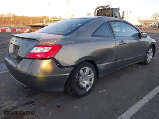 2007 Honda Civic Cpe LX with VIN 2HGFG12667H558133, listed as a IAAI auction lot 41203439 with 220,144 mi miles. Bid and sale history available at carsss.com. Image 6.