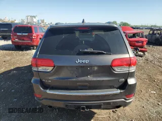 2017 Jeep Grand Cherokee Overland with VIN 1C4RJFCG0HC762612, listed as a Copart auction lot 57400095 with 122,702 mi miles and Salvage title. Bid and sale history available at DreamBid. Image 6.