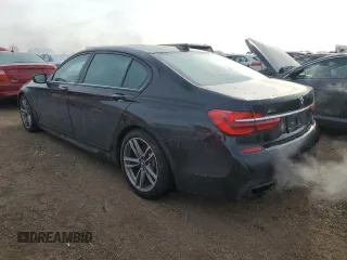 2019 BMW 7 Series 740i xDrive z VIN WBA7E4C50KGV28241, wystawiony jako Copart lot #87329774 z przebiegiem Nie podano mil oraz Szkoda całkowita • Salvage title. Historia ofert i sprzedaży dostępna na DreamBid. Obrazek 2.
