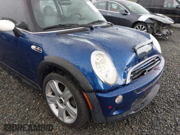 2003 MINI Hardtop S z VIN WMWRE33433TD60388, wystawiony jako IAAI lot #42313209 z przebiegiem 125 869 mil mil oraz . Historia ofert i sprzedaży dostępna na DreamBid. Obrazek 6.