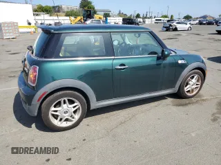 2009 MINI Hardtop S with VIN WMWMF73539TW85698, listed as a Copart auction lot 54957685 with 98,429 mi miles and Clean Title. Bid and sale history available at DreamBid. Image 3.