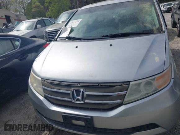 2012 Honda Odyssey EX-L with VIN 5FNRL5H66CB069916, listed as a IAAI auction lot 41935248 with 230,204 mi miles and . Bid and sale history available at carsss.com. Image 12.