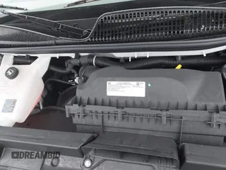 2024 Chevrolet Express Cargo with VIN 1GCWGAFPXR1274619, listed as a IAAI auction lot 41811735 with 11,970 mi miles and . Bid and sale history available at DreamBid. Image 10.