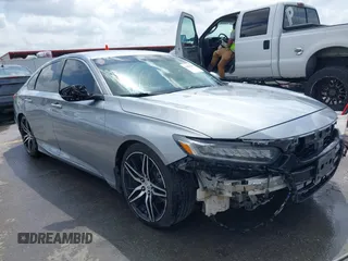 2020 Honda Accord Touring with VIN 1HGCV2F96LA018714, listed as a IAAI auction lot 42084295 with 74,861 mi miles and . Bid and sale history available at DreamBid. Image 1.