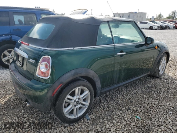 2015 MINI Convertible z VIN WMWZN3C5XFT861708, wystawiony jako Copart lot #82233054 z przebiegiem 38 498 mil mil oraz Czysty tytuł • Clean title. Historia ofert i sprzedaży dostępna na DreamBid. Obrazek 3.