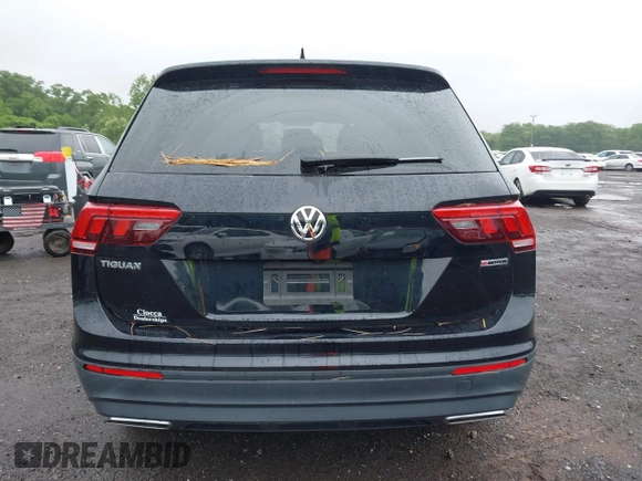 2021 Volkswagen Tiguan S z VIN 3VV0B7AX3MM031908, wystawiony jako IAAI lot #42504384 z przebiegiem 42 510 mil mil oraz . Historia ofert i sprzedaży dostępna na DreamBid. Obrazek 16.