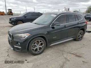 2017 BMW X1 xDrive28i with VIN WBXHT3C35H5F68752, listed as a Copart auction lot 49414675 with 114,308 mi miles and Clean Title. Bid and sale history available at carsss.com. Image 1.