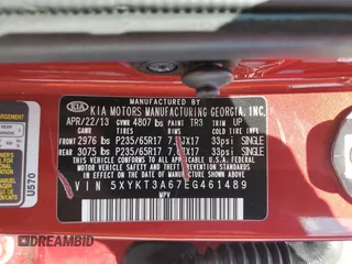 2014 Kia Sorento LX z VIN 5XYKT3A67EG461489, wystawiony jako Copart lot #57498295 z przebiegiem 198 799 mil mil oraz Szkoda całkowita • Salvage title. Historia ofert i sprzedaży dostępna na DreamBid. Obrazek 12.