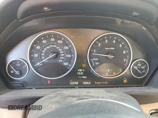 2013 BMW 3 Series 328i xDrive with VIN WBA3B3G58DNP38418, listed as a Copart auction lot 48253075 with 123,768 mi miles and Salvage title. Bid and sale history available at DreamBid. Image 9.