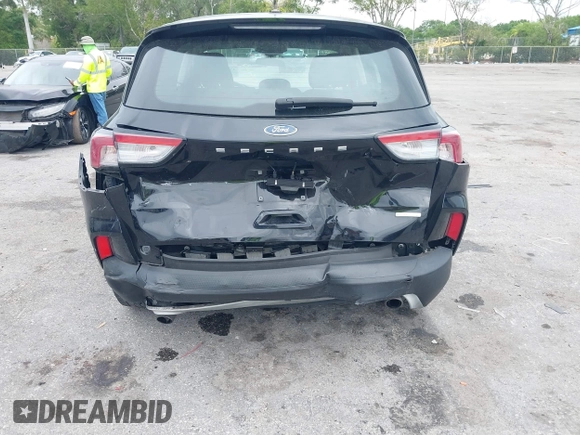 2020 Ford Escape S with VIN 1FMCU0F62LUB39164, listed as a IAAI auction lot 41864115 with 97,342 mi miles and . Bid and sale history available at carsss.com. Image 6.