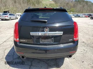 2014 Cadillac SRX Luxury Collection z VIN 3GYFNEE32ES647165, wystawiony jako Copart lot #52331335 z przebiegiem 27 277 mil mil oraz Szkoda całkowita • Salvage title. Historia ofert i sprzedaży dostępna na DreamBid. Obrazek 6.