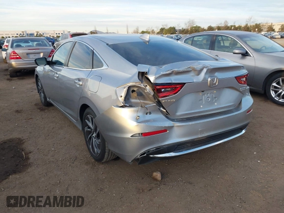2021 Honda Insight Touring with VIN 19XZE4F99ME009749, listed as a IAAI auction lot 41411868 with 54,808 mi miles and . Bid and sale history available at carsss.com. Image 3.