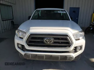2023 Toyota Tacoma SR5 z VIN 3TMAZ5CN3PM219718, wystawiony jako Copart lot #55253845 z przebiegiem 18 879 mil mil oraz Szkody całkowita. Historia ofert i sprzedaży dostępna na DreamBid. Obrazek 5.