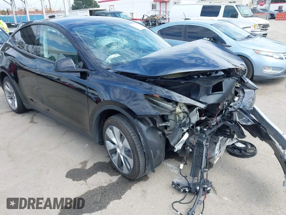 2023 Tesla Model Y Long Range z VIN 7SAYGDEE2PF863200, wystawiony jako IAAI lot #41805168 z przebiegiem 25 480 mil mil oraz . Historia ofert i sprzedaży dostępna na DreamBid. Obrazek 1.
