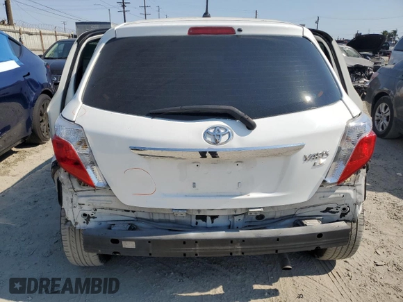 2012 Toyota Yaris L with VIN JTDKTUD30CD527531, listed as a Copart auction lot 65022015 with 157,177 mi miles and Salvage title. Bid and sale history available at DreamBid. Image 6.