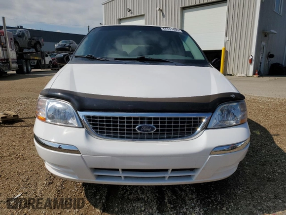 2001 Ford Windstar SEL with VIN 2FMDA56461BA55148, listed as a Copart auction lot 66531405 with 74,409 mi miles and Salvage title. Bid and sale history available at DreamBid. Image 5.
