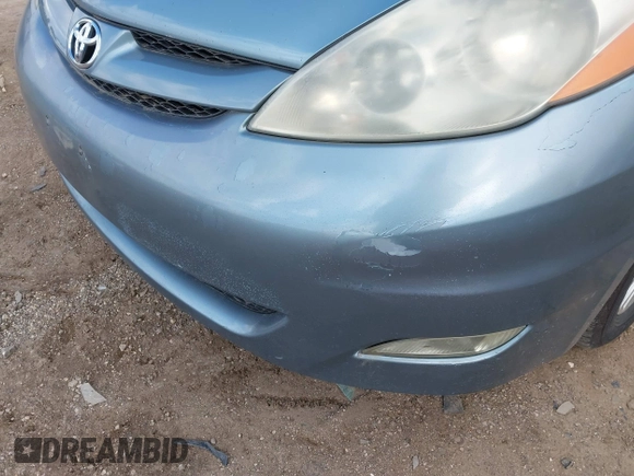 2007 Toyota Sienna XLE with VIN 5TDZK22C37S053965, listed as a IAAI auction lot 41902226 with 239,910 mi miles. Bid and sale history available at carsss.com. Image 6.