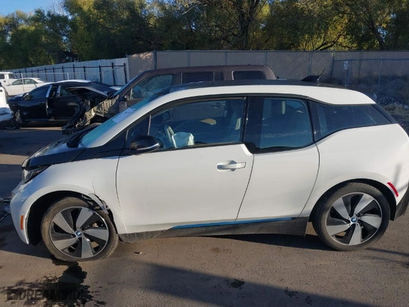 2015 BMW i3 with VIN WBY1Z4C52FV503063, listed as a IAAI auction lot 40644359 with NaN miles. Bid and sale history available at carsss.com. Image 14.