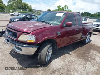 1998 Ford F-150 XL with VIN 2FTRX08L8WCA36361, listed as a IAAI auction lot 42617079 with 263,666 mi miles and . Bid and sale history available at DreamBid. Image 2.