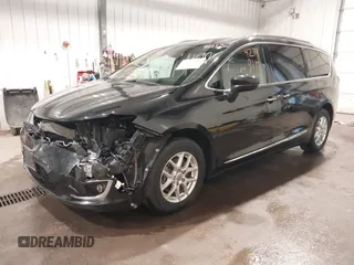 2020 Chrysler Pacifica Touring L with VIN 2C4RC1BG9LR140072, listed as a IAAI auction lot 42199118 with 93,557 mi miles and . Bid and sale history available at DreamBid. Image 2.