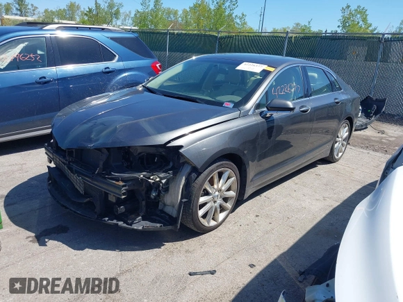 2015 Lincoln MKZ z VIN 3LN6L2G93FR607192, wystawiony jako IAAI lot #42226377 z przebiegiem 74 018 mil mil oraz . Historia ofert i sprzedaży dostępna na DreamBid. Obrazek 2.