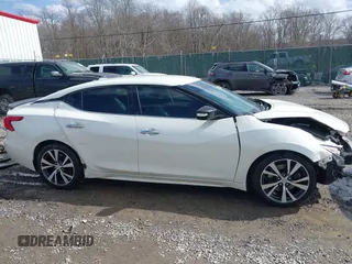 2017 Nissan Maxima SV with VIN 1N4AA6APXHC416086, listed as a IAAI auction lot 41694314 with 192,513 mi miles and . Bid and sale history available at DreamBid. Image 14.