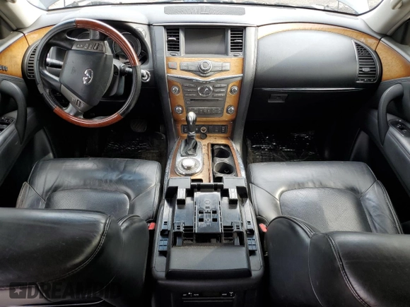 2011 Infiniti QX56 7-passenger with VIN JN8AZ2NE4B9006770, listed as a Copart auction lot 61839625 with 208,427 mi miles and Salvage title. Bid and sale history available at DreamBid. Image 8.