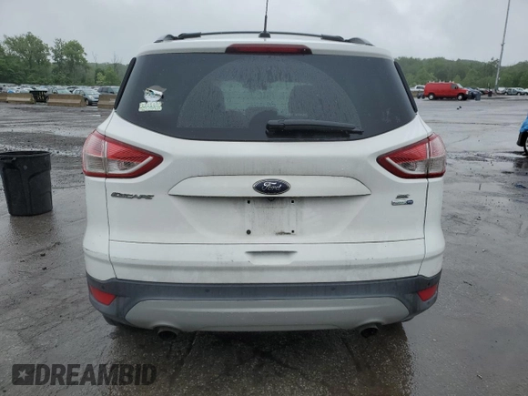 2014 Ford Escape SE with VIN 1FMCU9GX1EUE28700, listed as a Copart auction lot 59841745 with 135,210 mi miles and Salvage title. Bid and sale history available at DreamBid. Image 6.