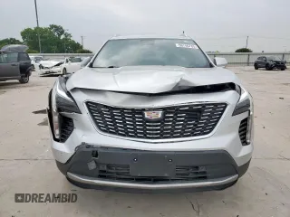 2020 Cadillac XT4 FWD Premium Luxury z VIN 1GYFZCR42LF115413, wystawiony jako Copart lot #56746785 z przebiegiem 41 296 mil mil oraz Szkody całkowita. Historia ofert i sprzedaży dostępna na DreamBid. Obrazek 5.