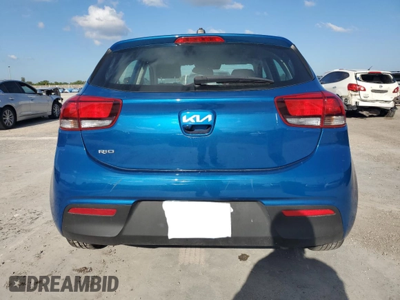2023 Kia Rio S with VIN 3KPA25AD9PE548173, listed as a Copart auction lot 50232915 with 26,668 mi miles and Salvage Title. Bid and sale history available at DreamBid. Image 6.